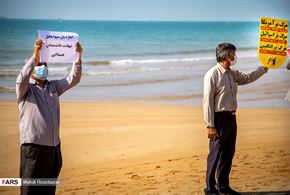 زنجیره انسانی محکومیت ترور در کنار خلیج‌فارس
